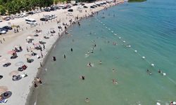 Tatilciler Ege sahillerini aratmayan Hazar Gölü’ne akın etti